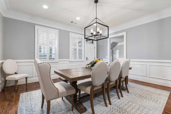 a kitchen with stainless steel appliances granite countertop a sink and a refrigerator