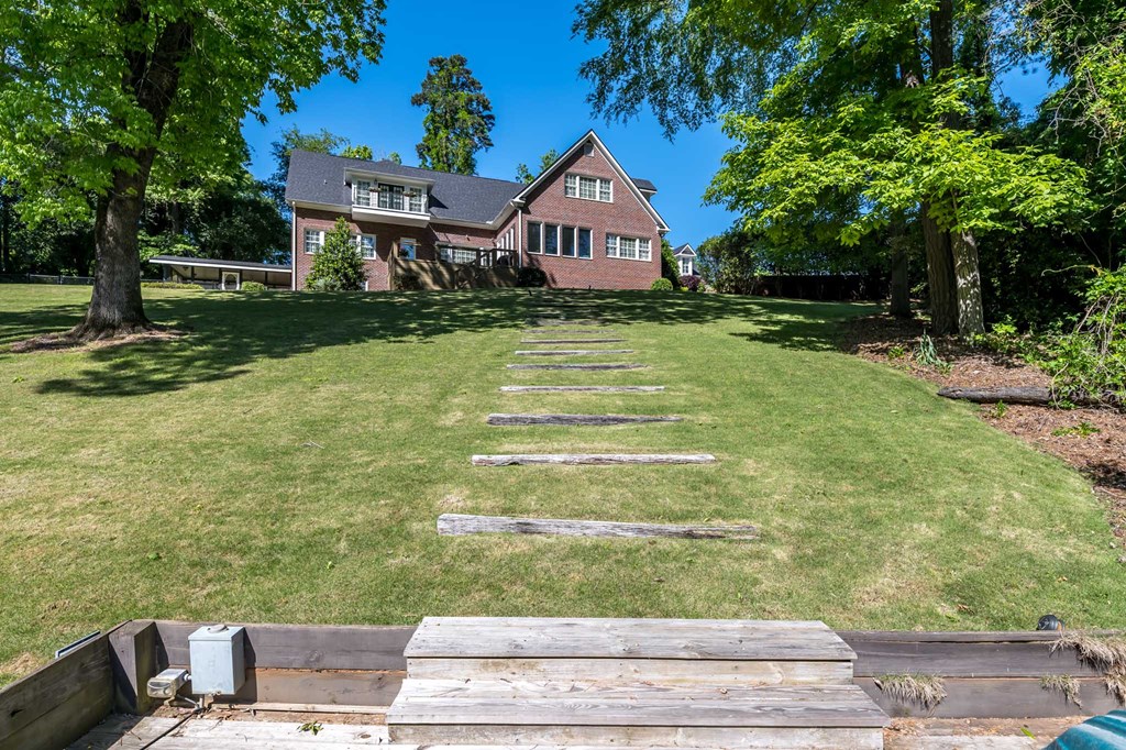 306 Cascade Road Columbus, GA 31904 - Photo 9 of 67 a front view of a house with garden
