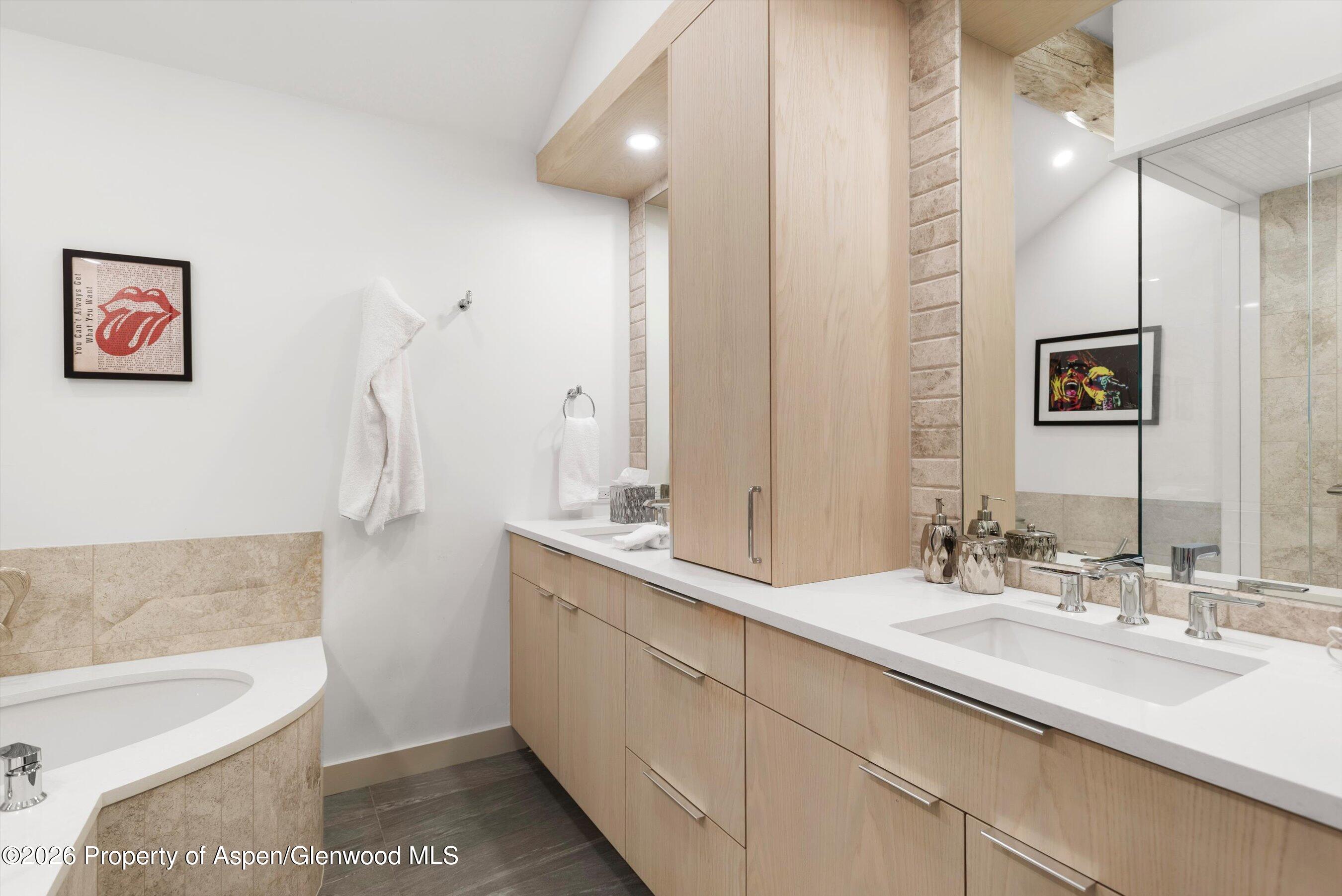 1258 Juniper Hill Road Aspen, CO 81611 - Photo 11 of 25 a bathroom with a sink a toilet and tub