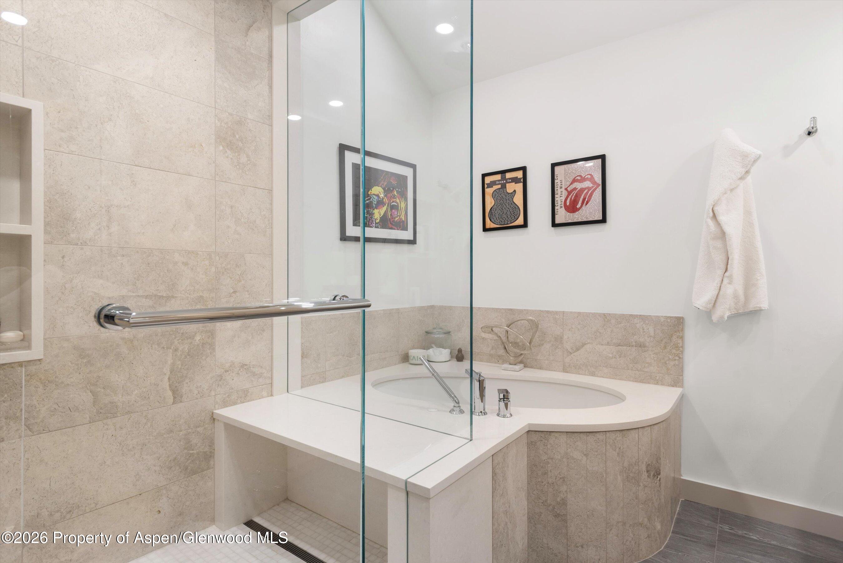 1258 Juniper Hill Road Aspen, CO 81611 - Photo 12 of 25 a bathroom with a bath tub and shower