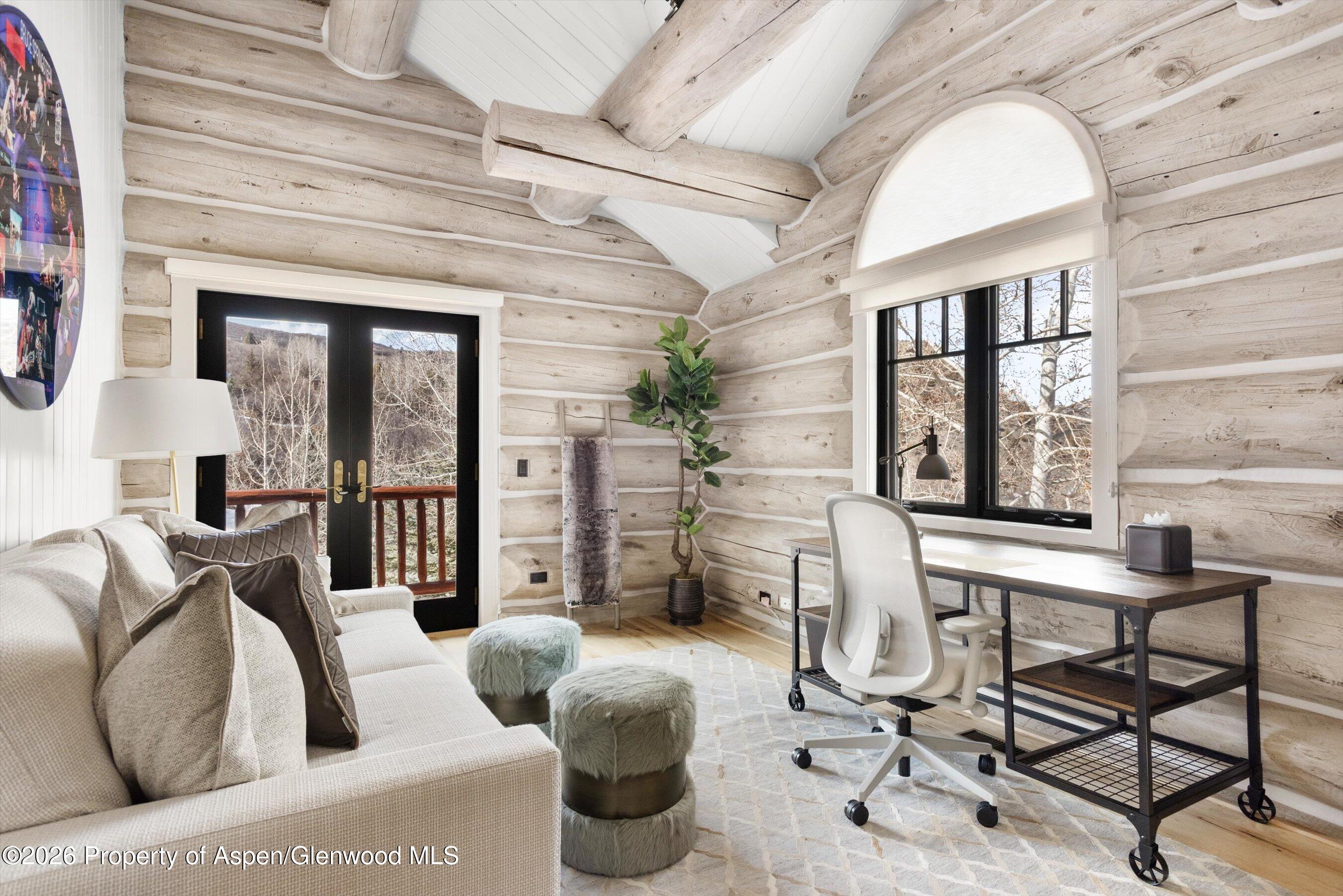 1258 Juniper Hill Road Aspen, CO 81611 - Photo 20 of 25 a living room with furniture and a window