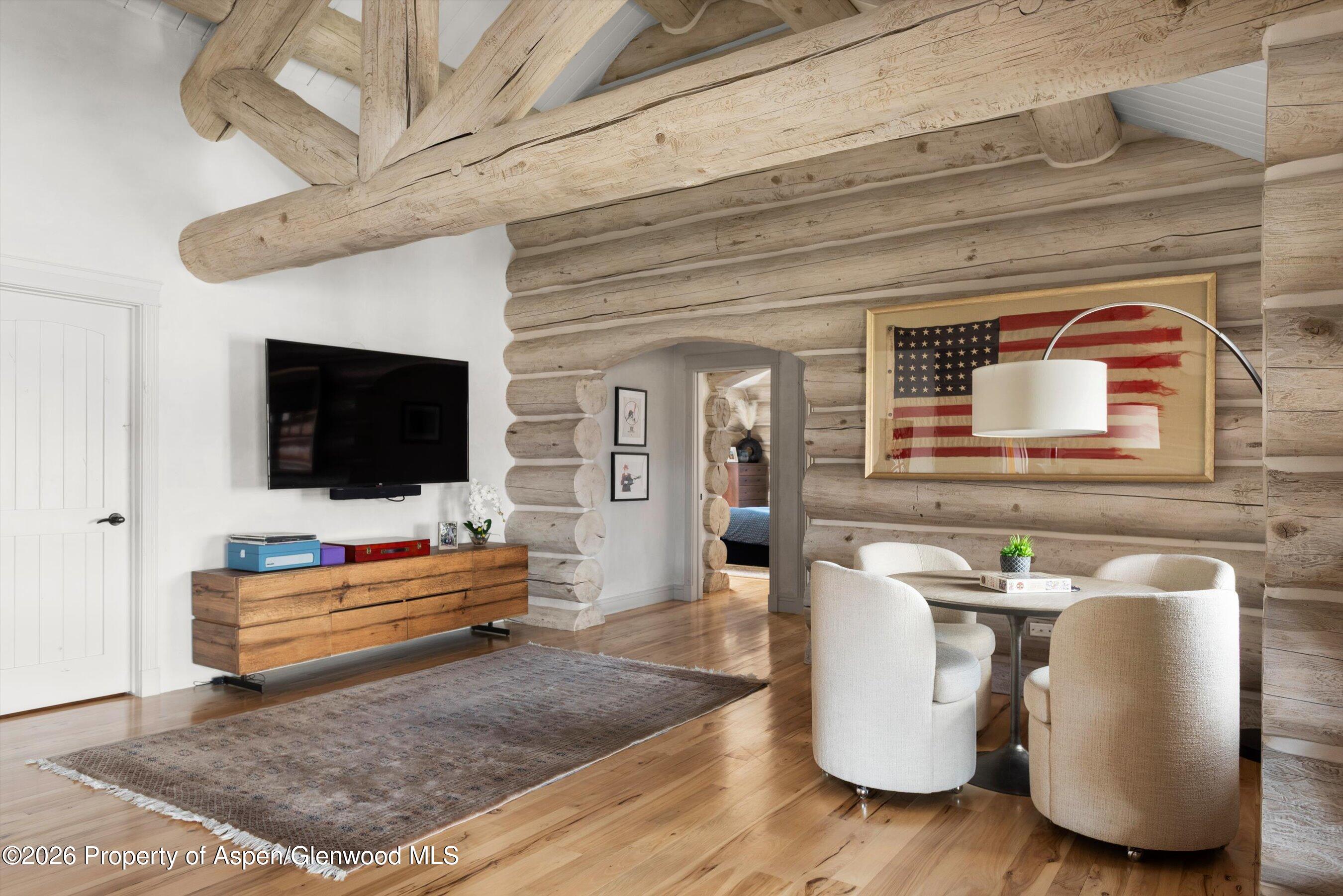 1258 Juniper Hill Road Aspen, CO 81611 - Photo 22 of 25 a living room with furniture and a flat screen tv