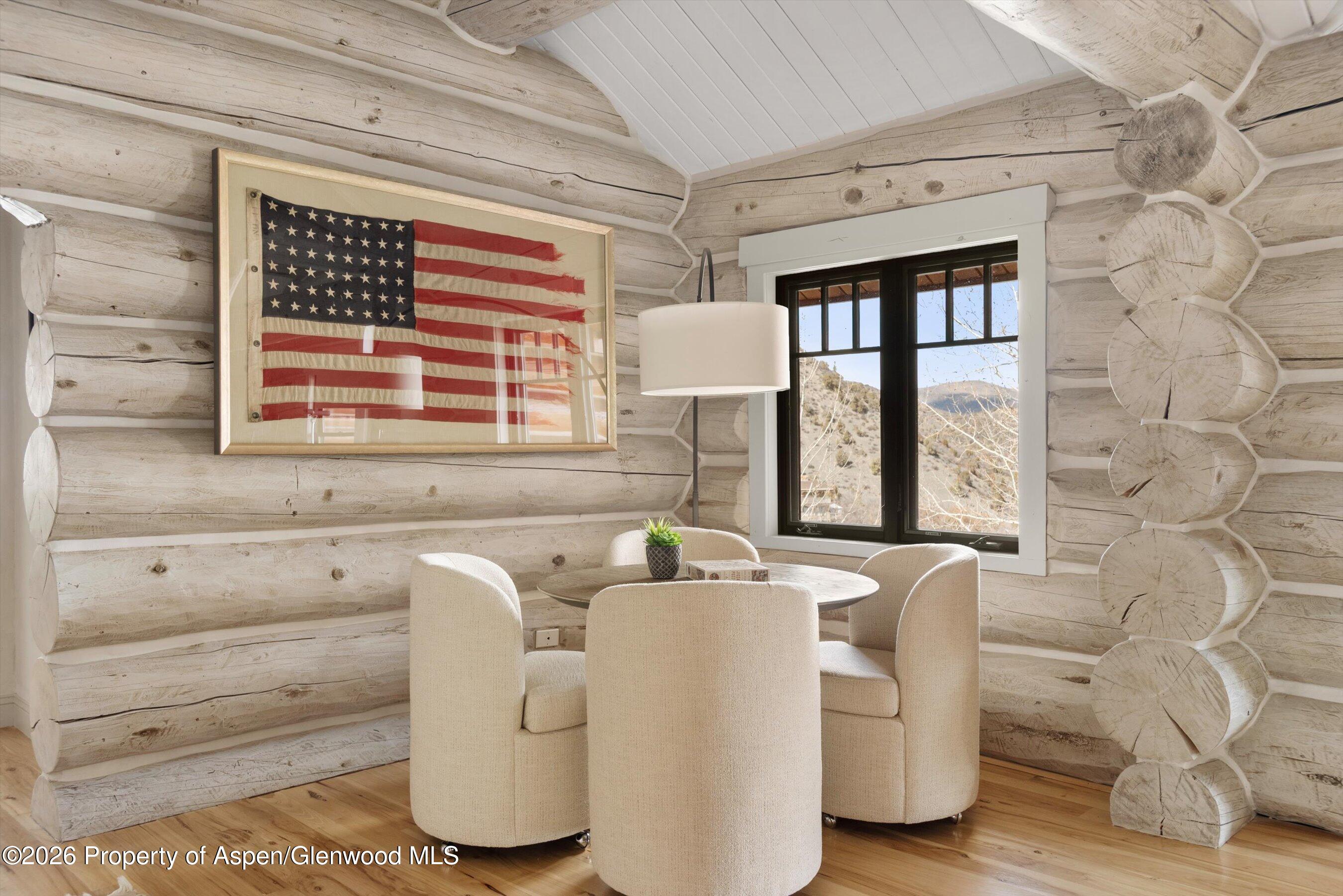 1258 Juniper Hill Road Aspen, CO 81611 - Photo 23 of 25 a dining room with furniture and windows