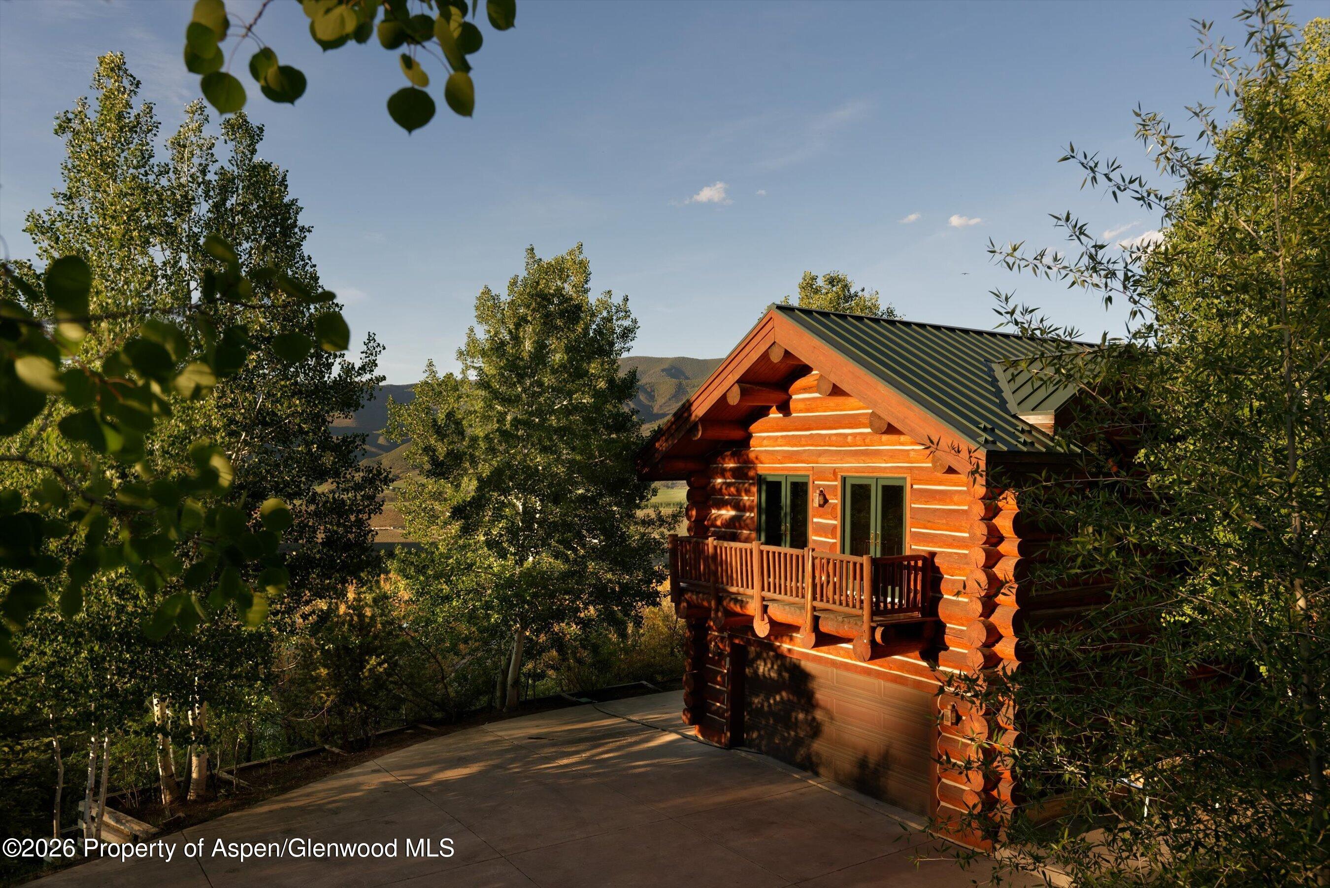 1258 Juniper Hill Road Aspen, CO 81611 - Photo 3 of 25 an aerial view of a house