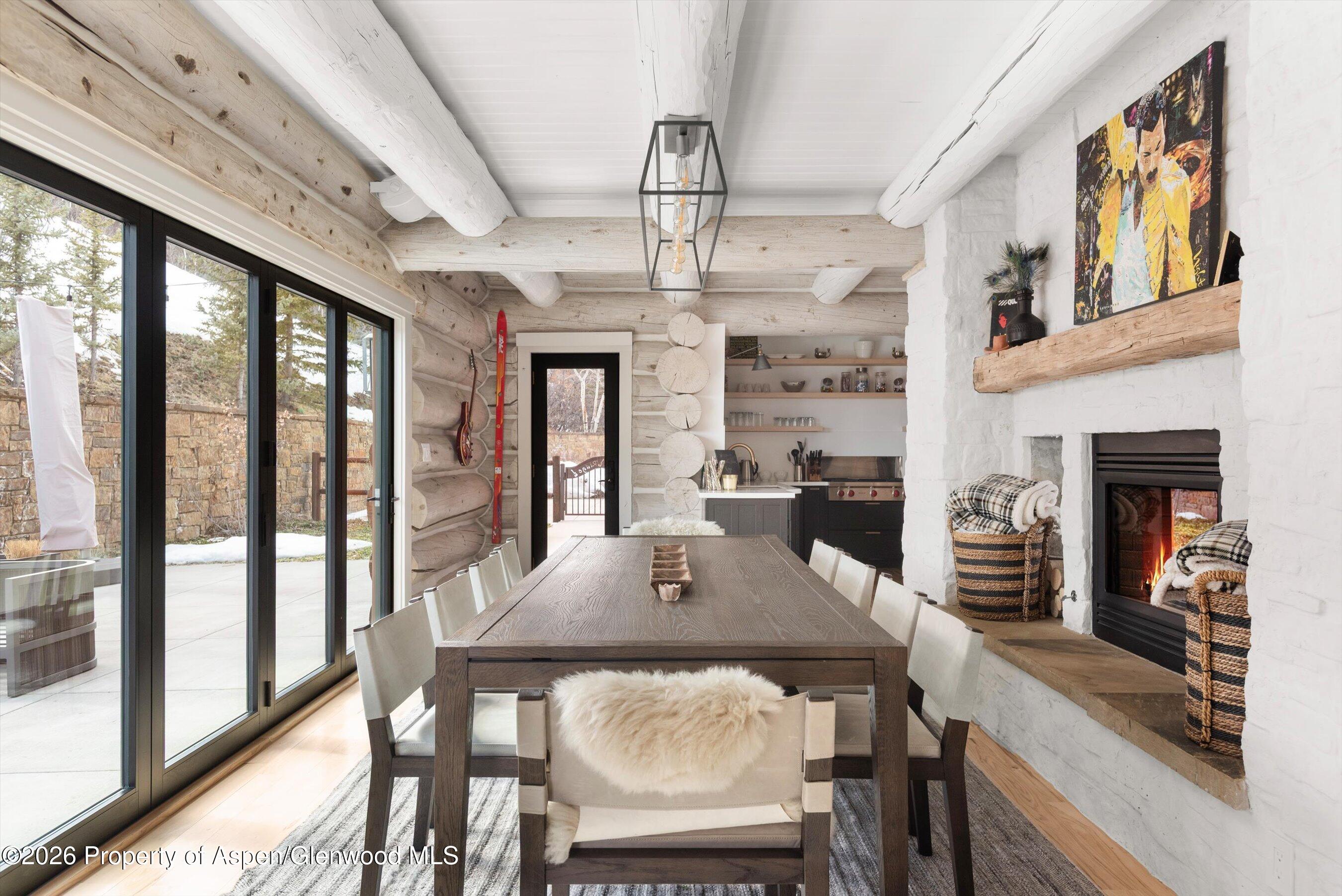 1258 Juniper Hill Road Aspen, CO 81611 - Photo 5 of 25 a view of a dining room with furniture window and outside view