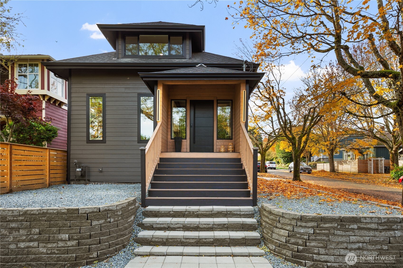 829 27th Avenue Seattle, WA 98122 - Photo 2 of 38 a front view of a house with a garden