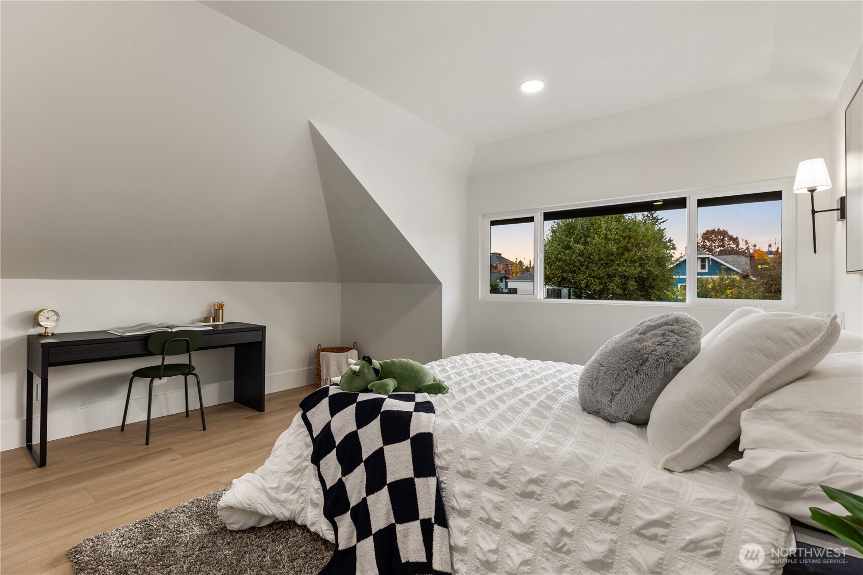 829 27th Avenue Seattle, WA 98122 - Photo 22 of 38 a bedroom with a bed and a large window