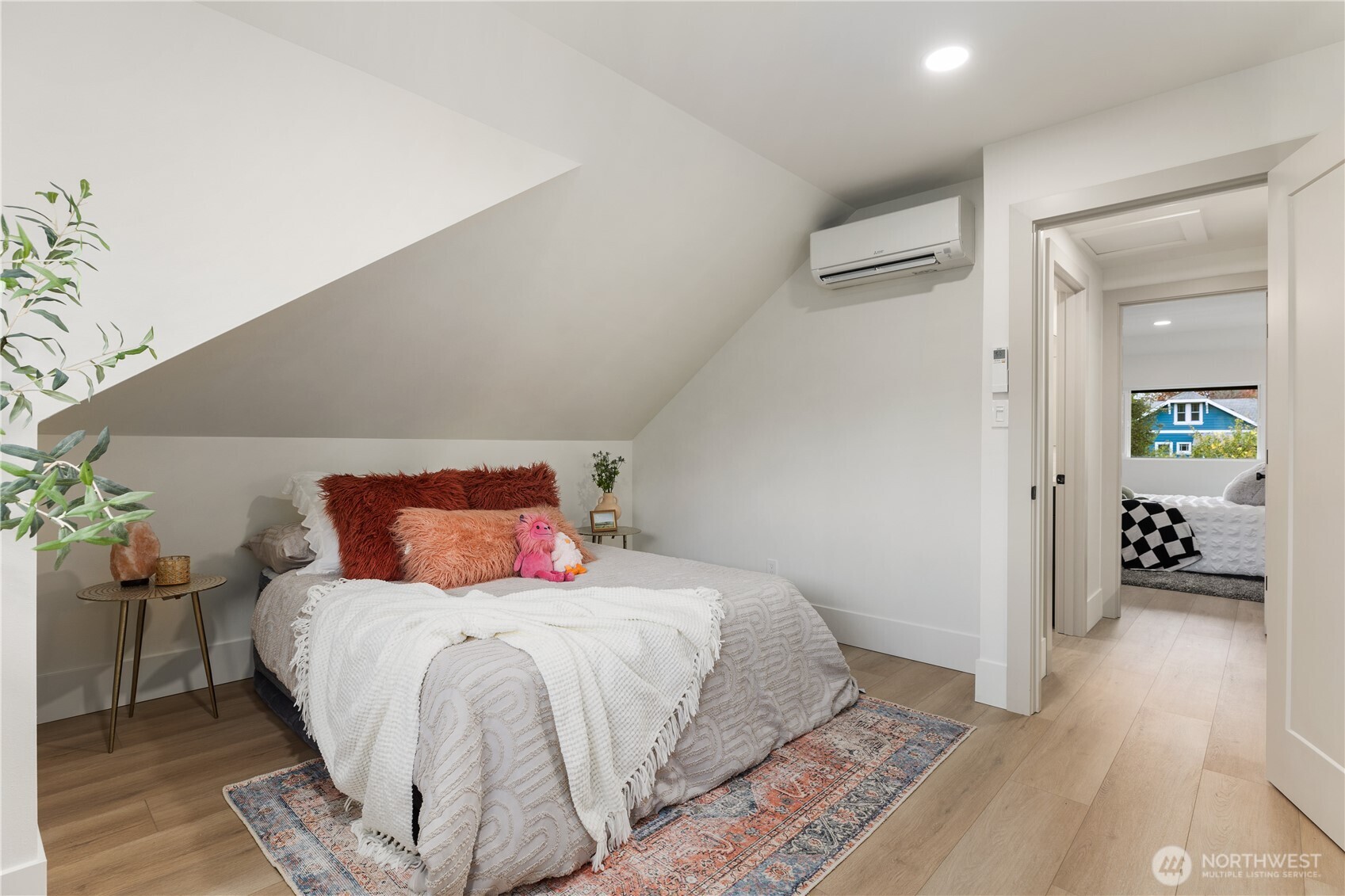 829 27th Avenue Seattle, WA 98122 - Photo 25 of 38 a bedroom with a bed and a view of bathroom