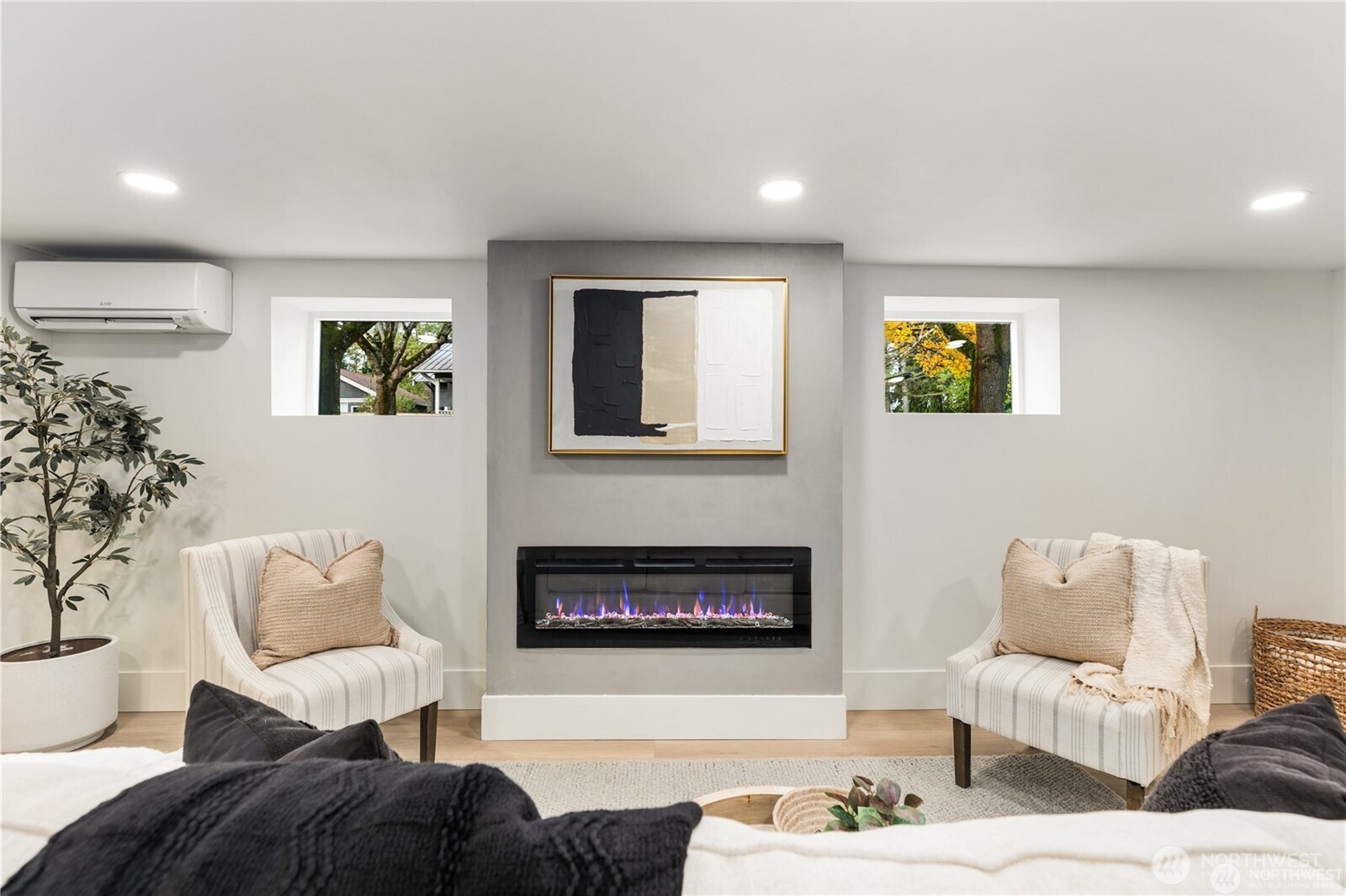 829 27th Avenue Seattle, WA 98122 - Photo 26 of 38 a living room with furniture and a fireplace