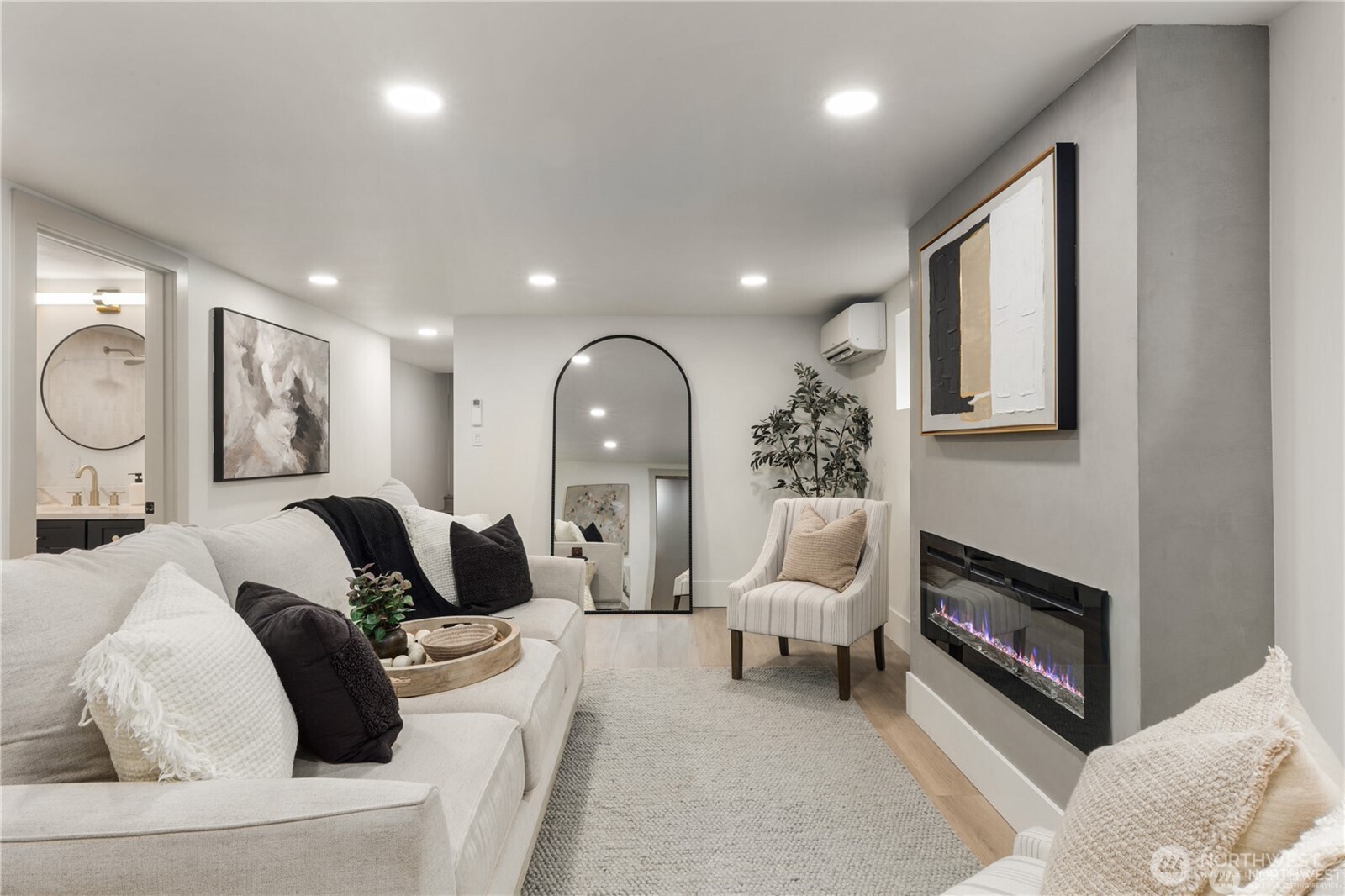 829 27th Avenue Seattle, WA 98122 - Photo 27 of 38 a living room with furniture fireplace and a mirror