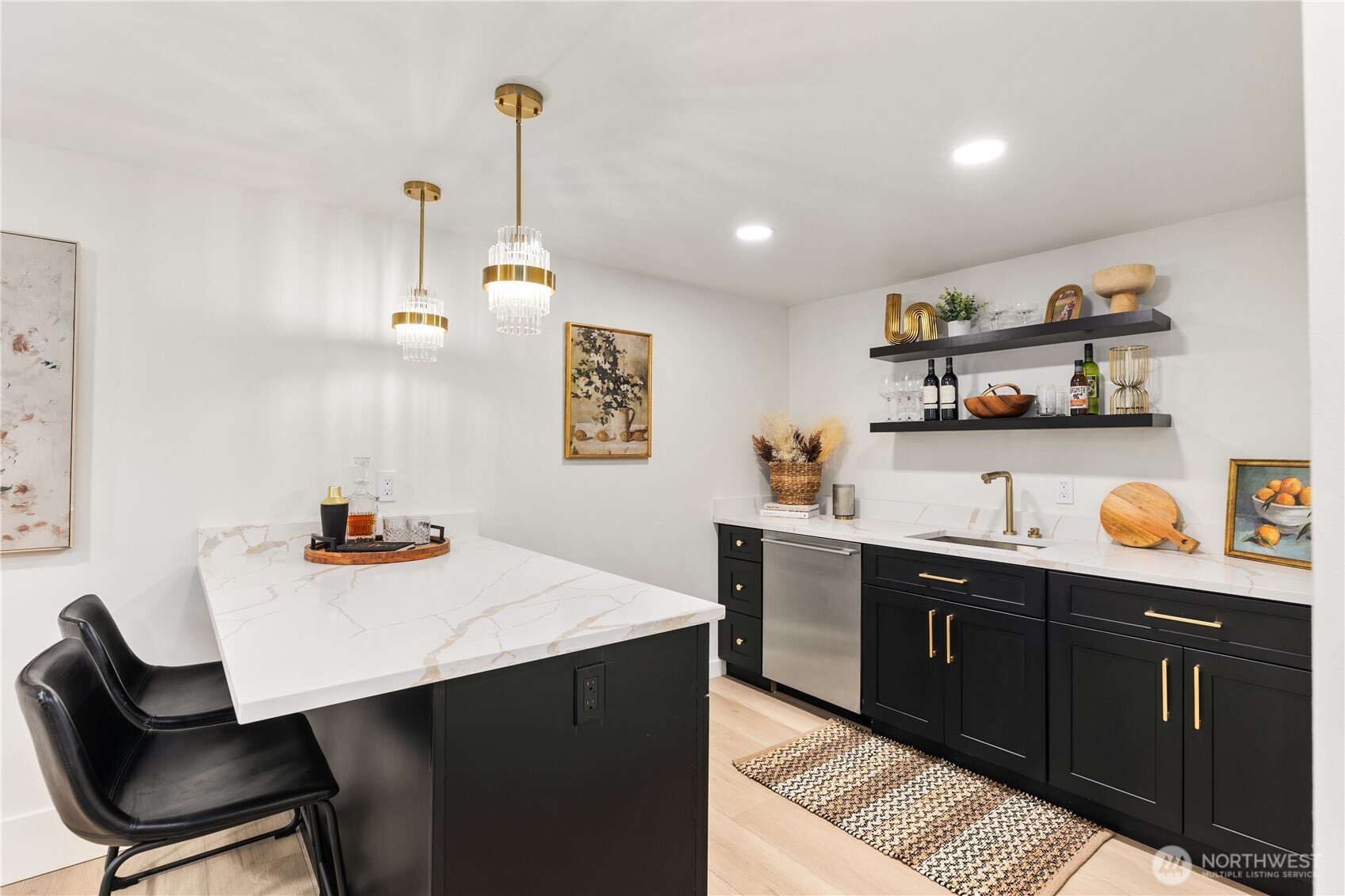 829 27th Avenue Seattle, WA 98122 - Photo 29 of 38 a kitchen with a sink cabinets and wooden floor
