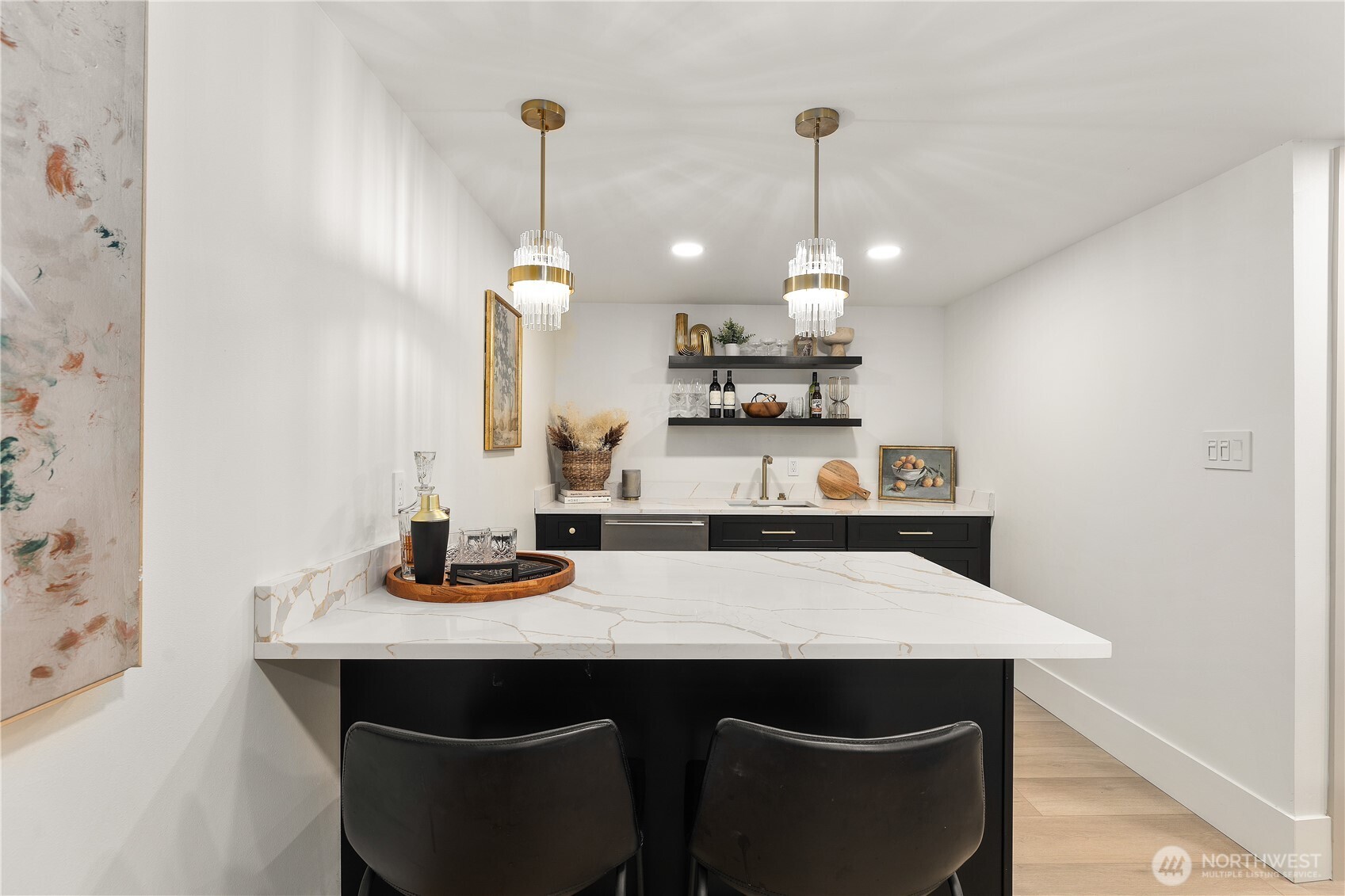 829 27th Avenue Seattle, WA 98122 - Photo 30 of 38 a kitchen with kitchen island stainless steel appliances a sink center island and cabinets