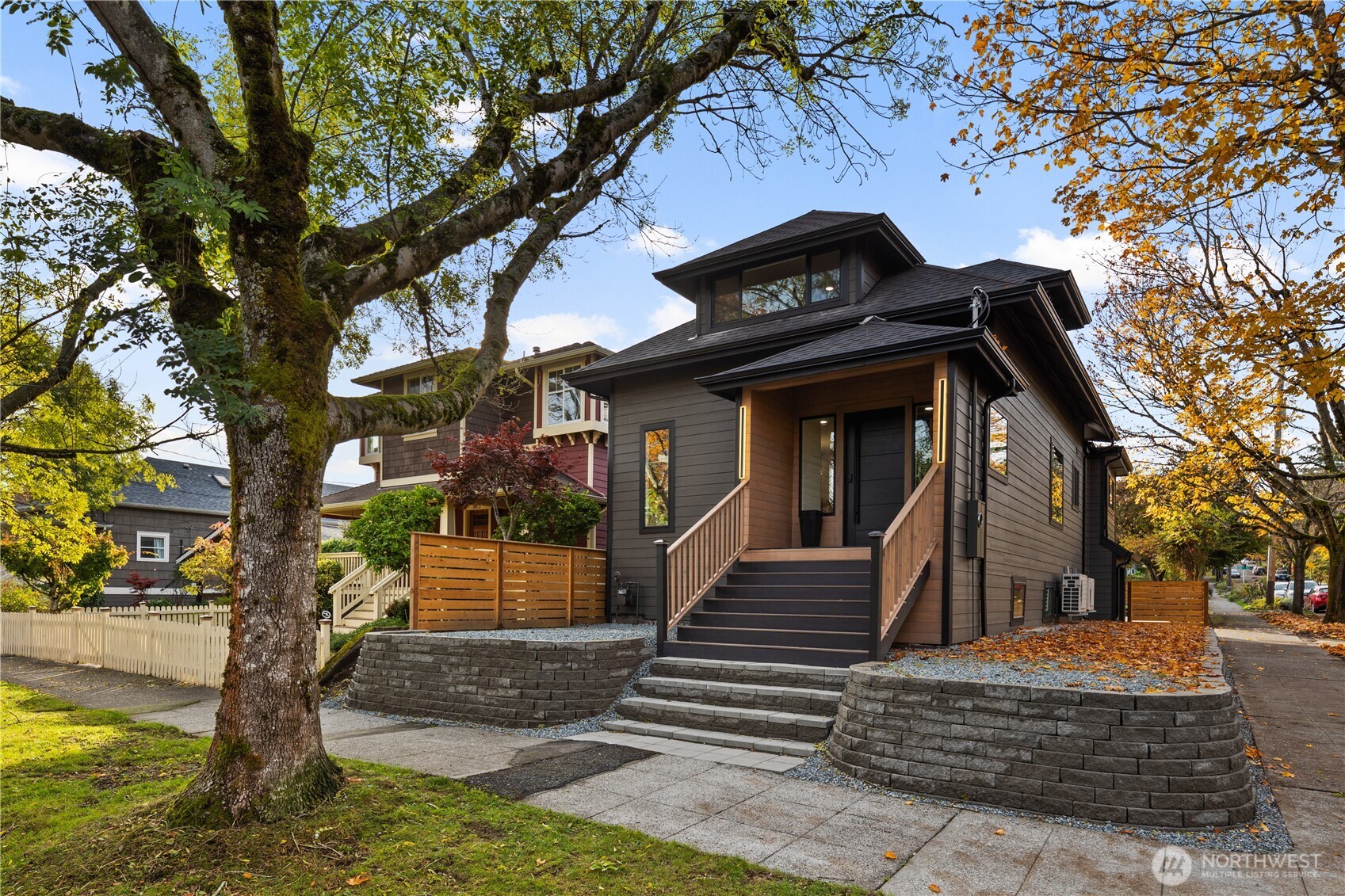 829 27th Avenue Seattle, WA 98122 - Photo 3 of 38 a view of a house with a large tree