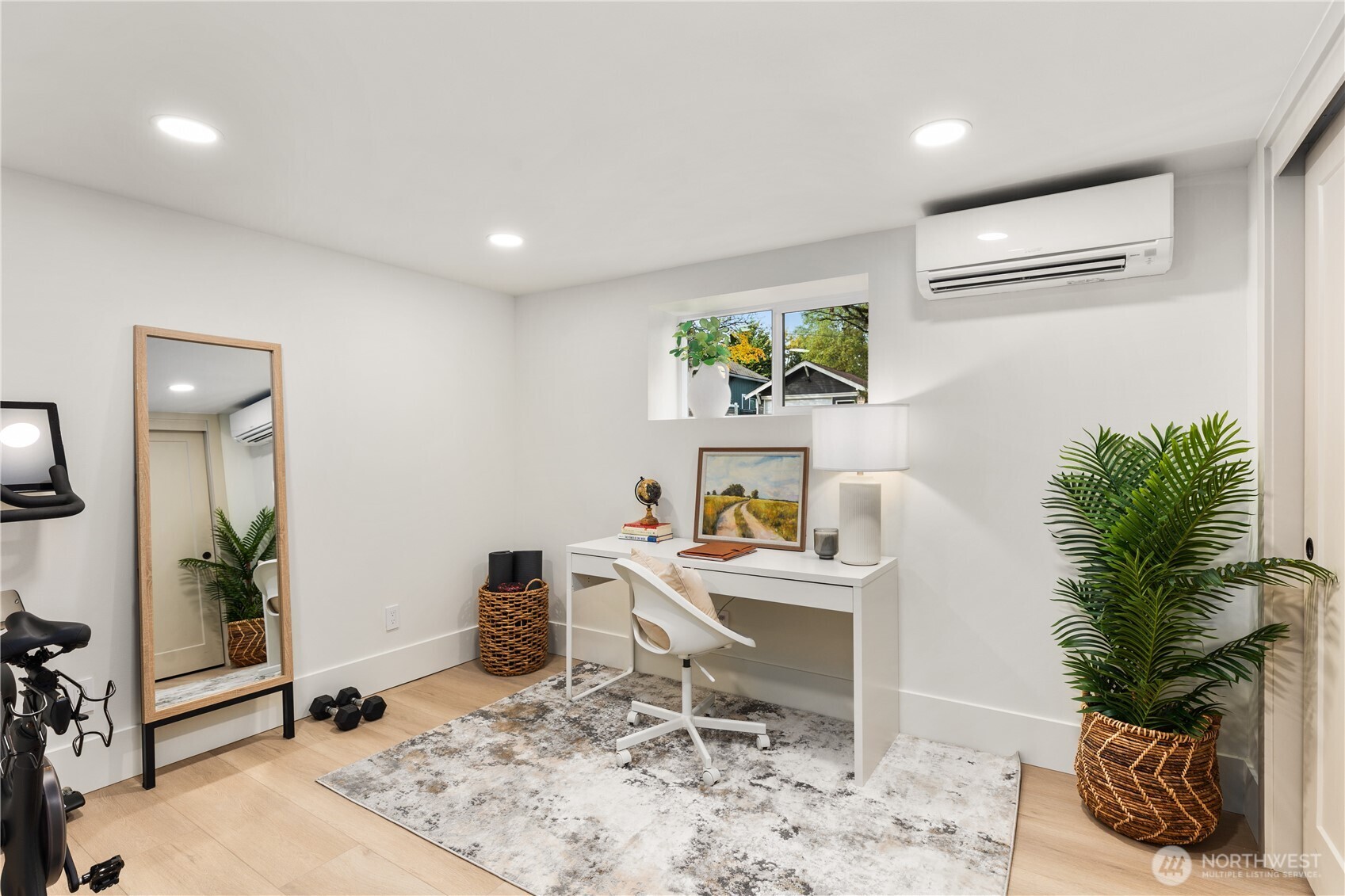 829 27th Avenue Seattle, WA 98122 - Photo 32 of 38 a workspace with furniture and a potted plant