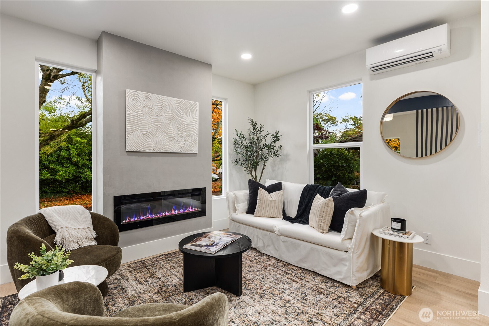 829 27th Avenue Seattle, WA 98122 - Photo 8 of 38 a living room with furniture fireplace and a large window