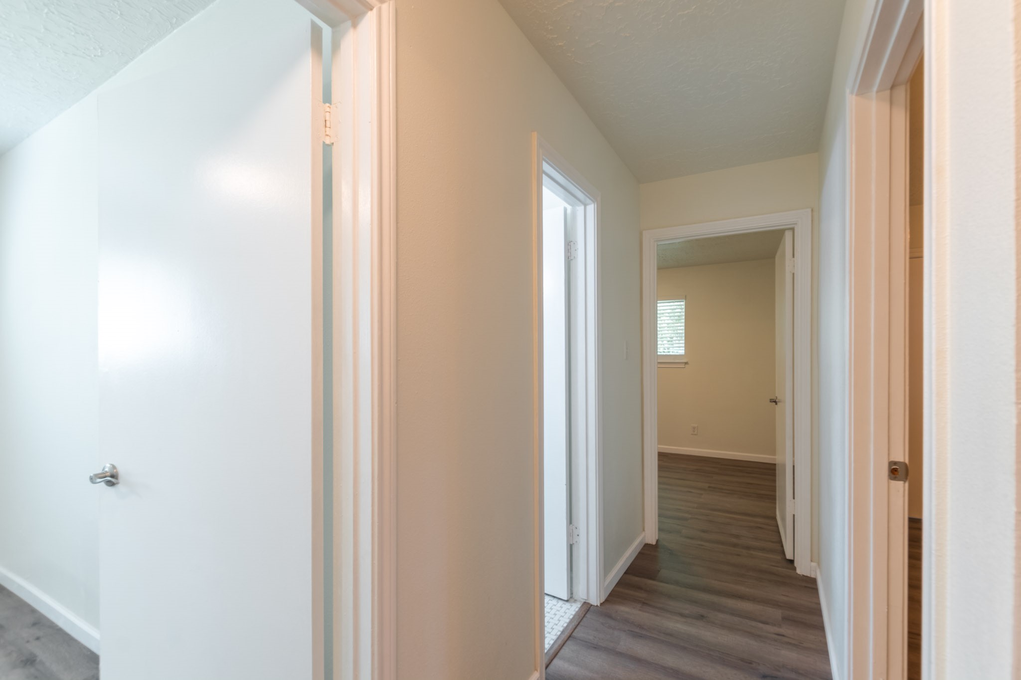 9646 Springview Lane Houston, TX 77080 - Photo 14 of 32 a view of a bathroom from the hallway