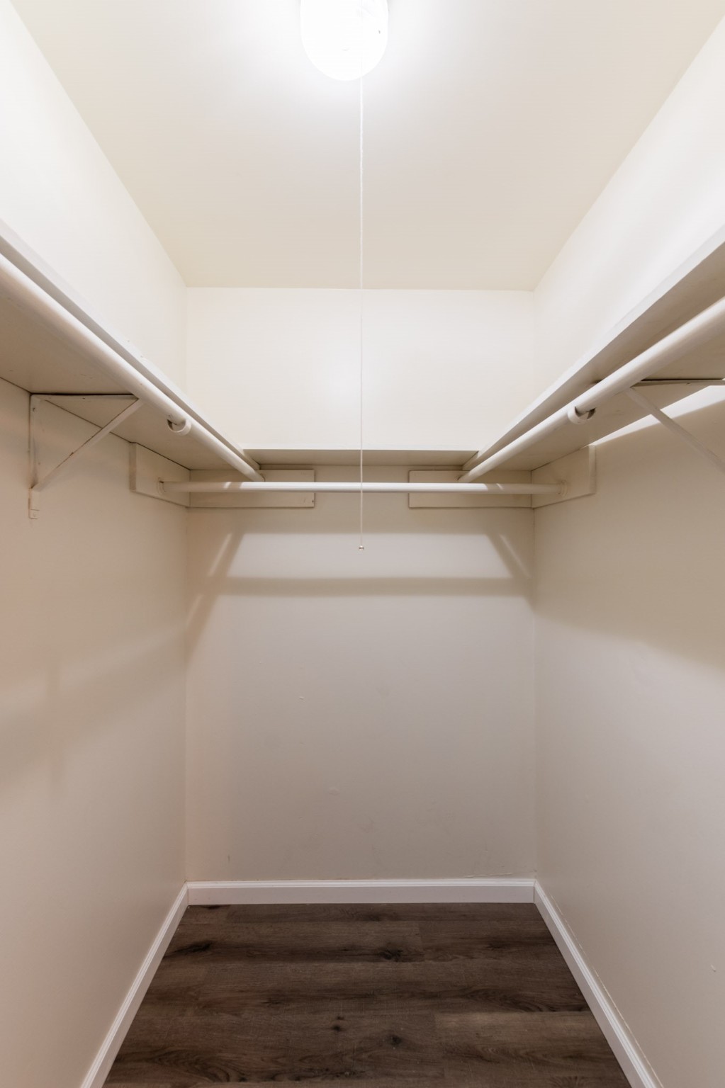 9646 Springview Lane Houston, TX 77080 - Photo 25 of 32 a view of an empty walk in closet