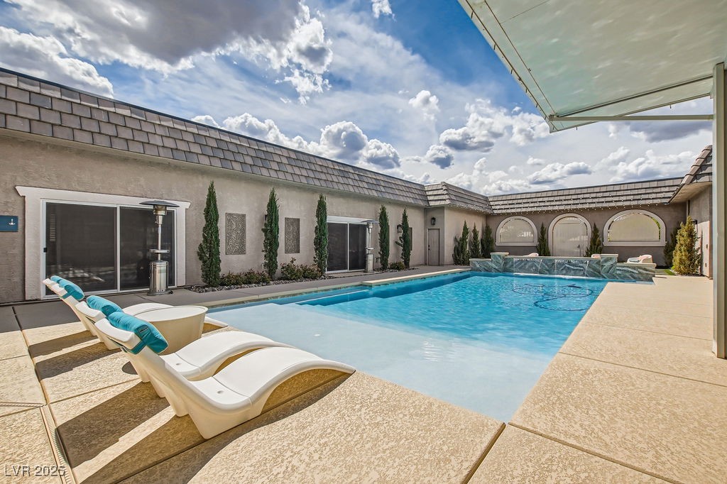 647 Foxhall Road Henderson, NV 89002 - Photo 44 of 82 Outdoor pool with a patio
