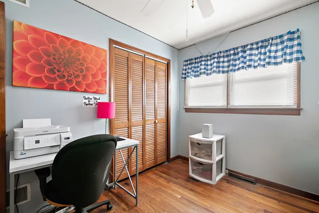 a workspace with furniture and a window