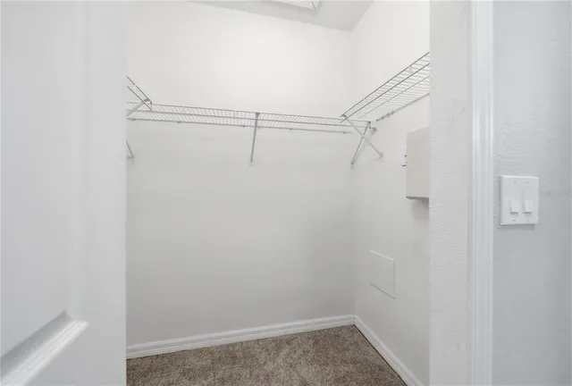 a view of a room with racks on the wall