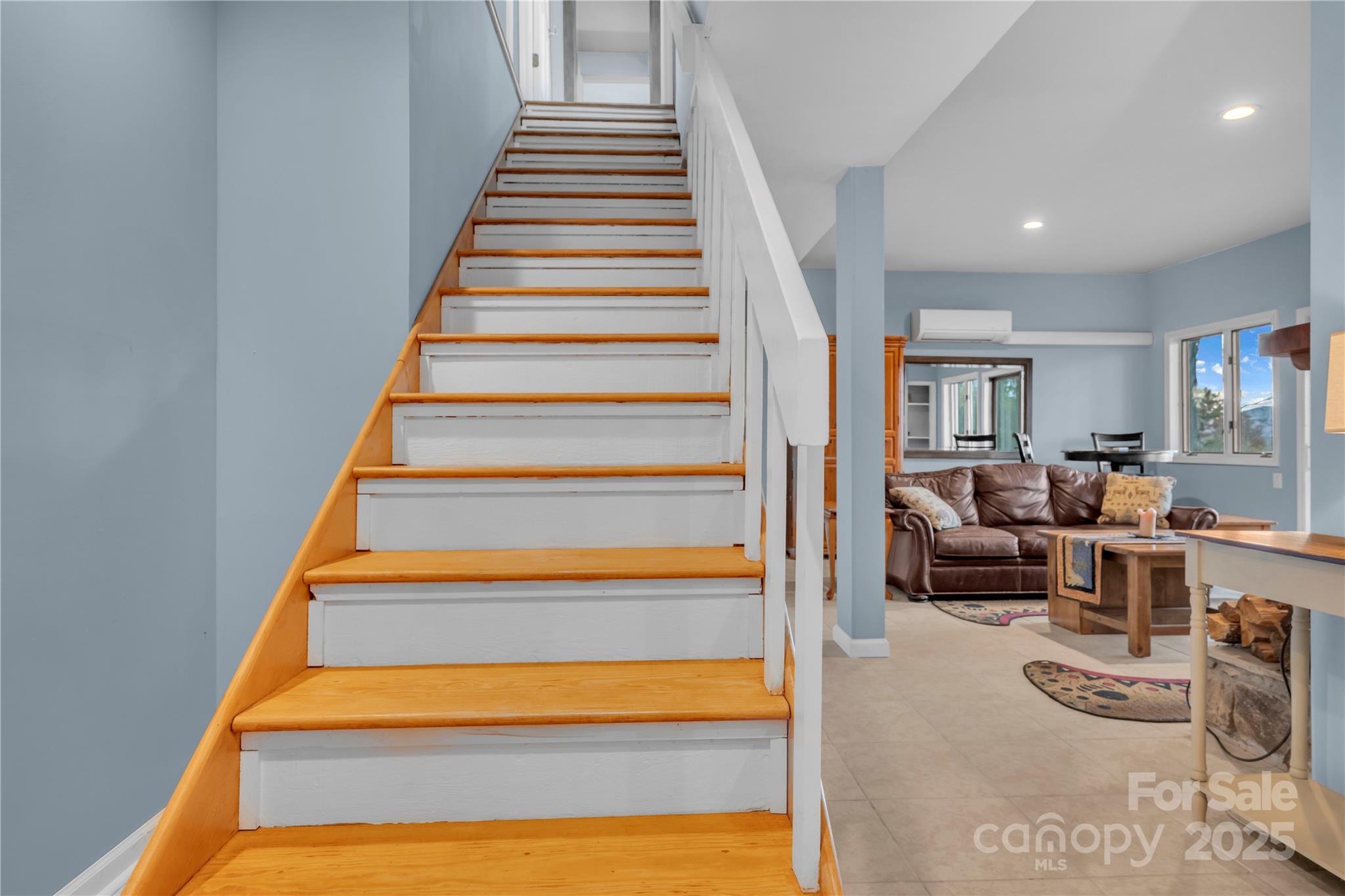 555 Glenview Road Newland, NC 28657 - Photo 23 of 48 a living room with furniture or wooden floor and a chandelier