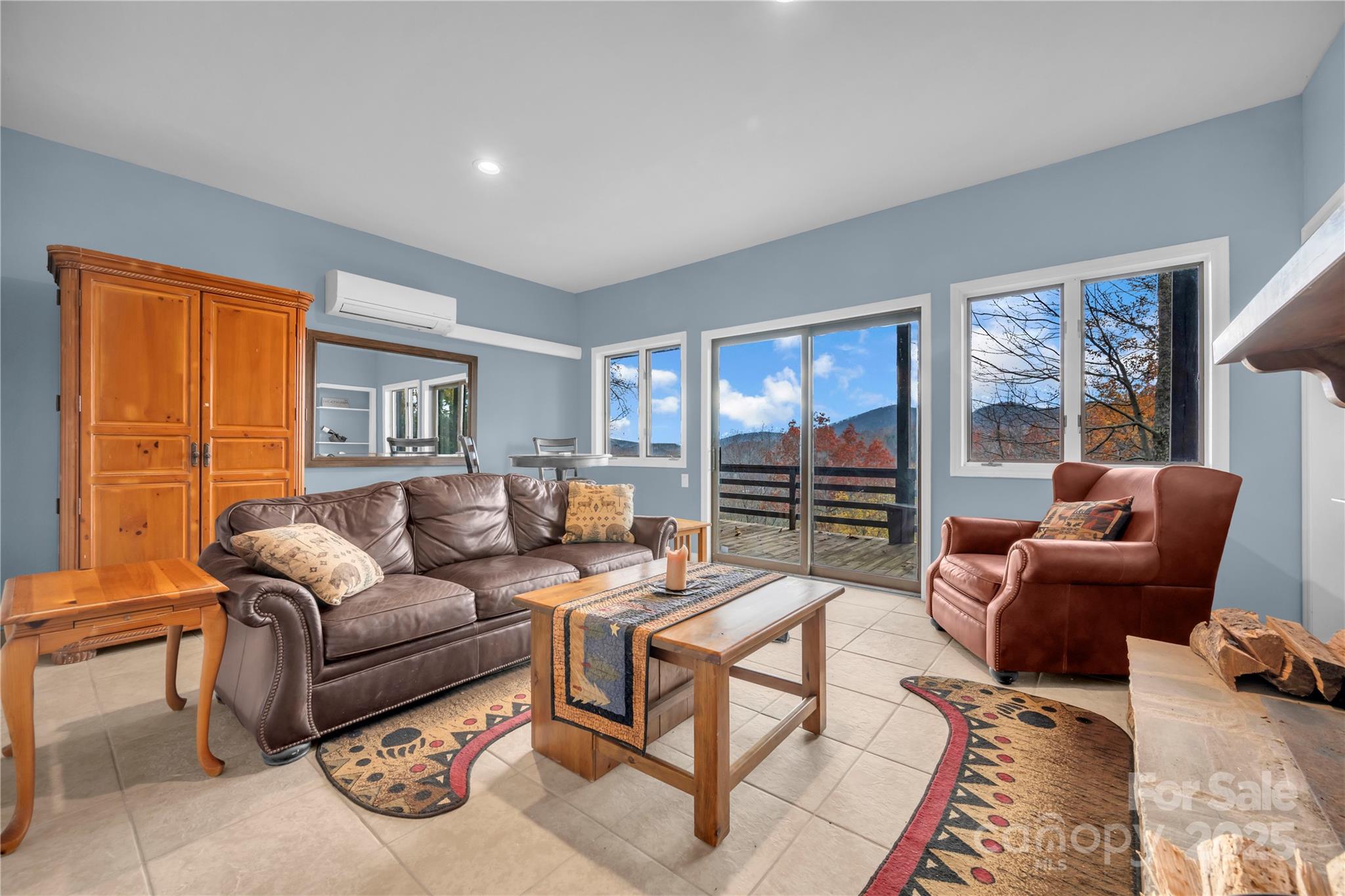 555 Glenview Road Newland, NC 28657 - Photo 26 of 48 a living room with furniture a large window and table