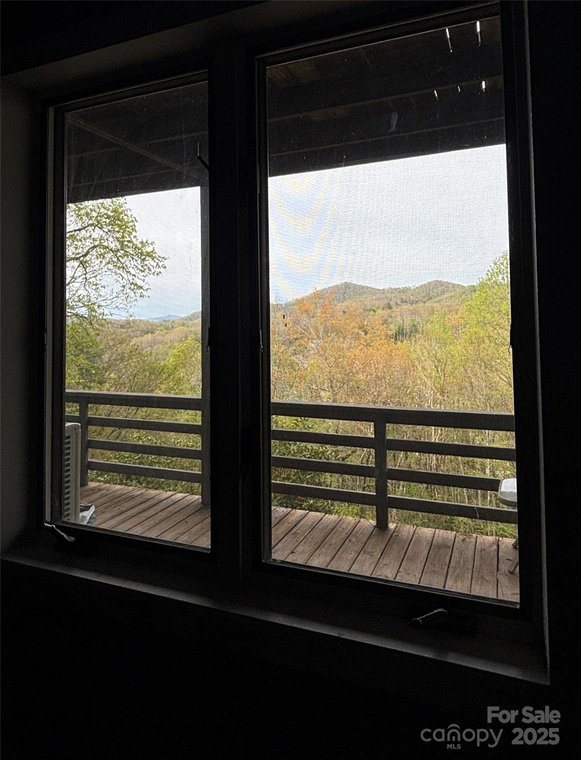555 Glenview Road Newland, NC 28657 - Photo 33 of 48 a view of a room with a large window