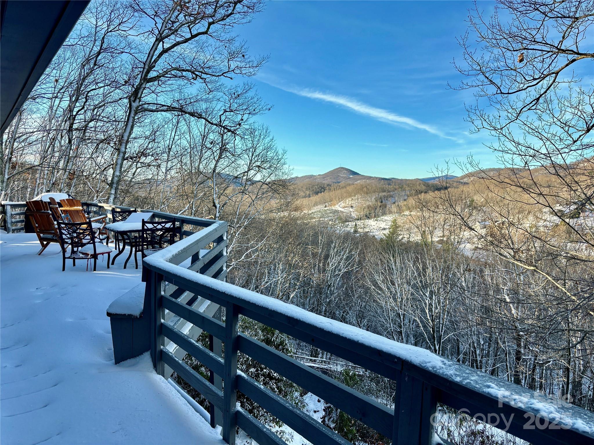 555 Glenview Road Newland, NC 28657 - Photo 37 of 48 a view of a chairs and table in the balcony