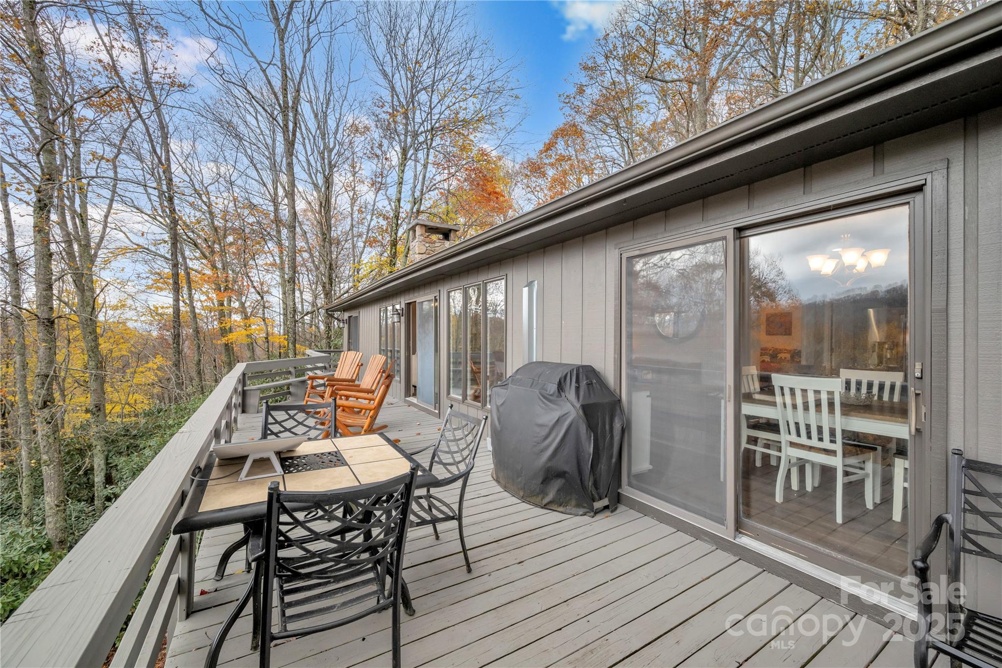 555 Glenview Road Newland, NC 28657 - Photo 46 of 48 a balcony with furniture and wooden floor