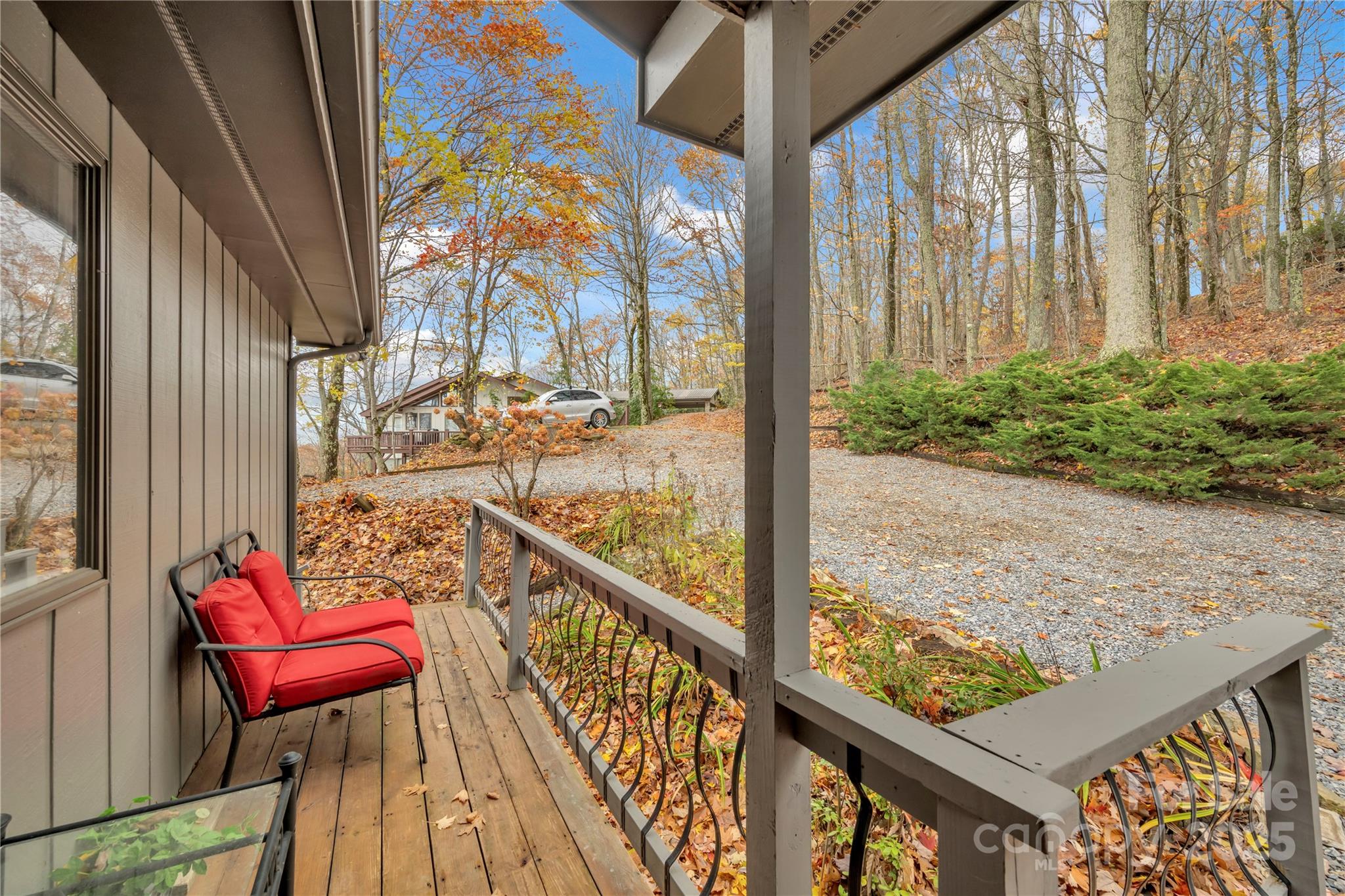 555 Glenview Road Newland, NC 28657 - Photo 47 of 48 a view of a two chairs in the balcony