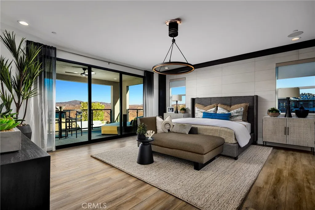 2291 Bliss Rnch Road Santa Rosa, CA 95401 - Photo 9 of 15 a spacious bedroom with a bed couch and a large window