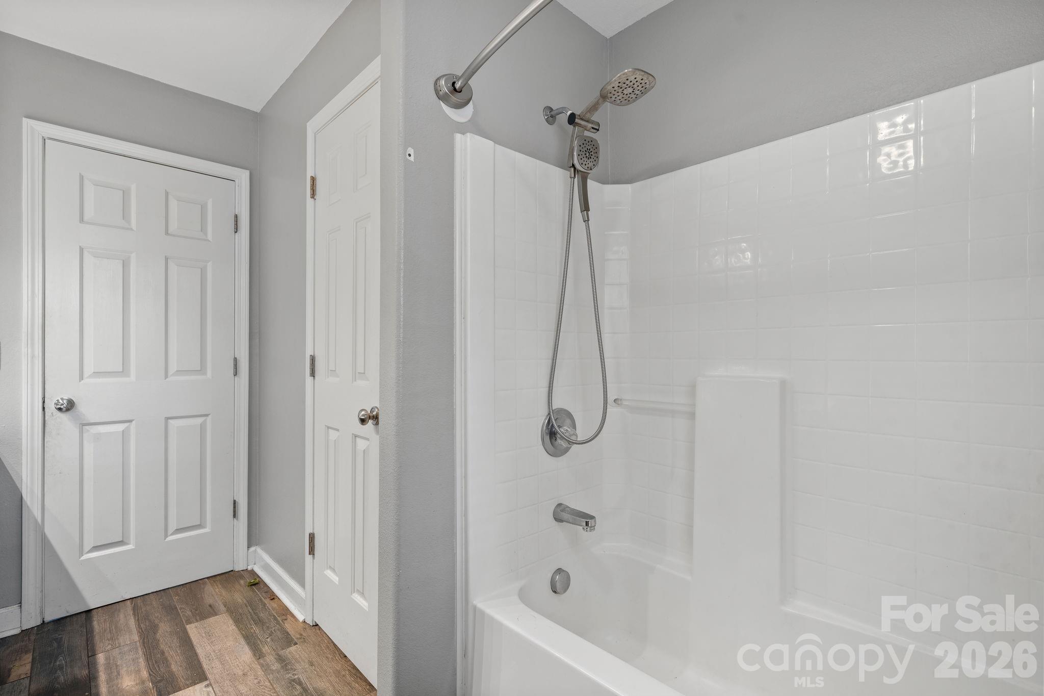 309 Sheldon Street Hudson, NC 28638 - Photo 20 of 35 a bathroom with a bathtub