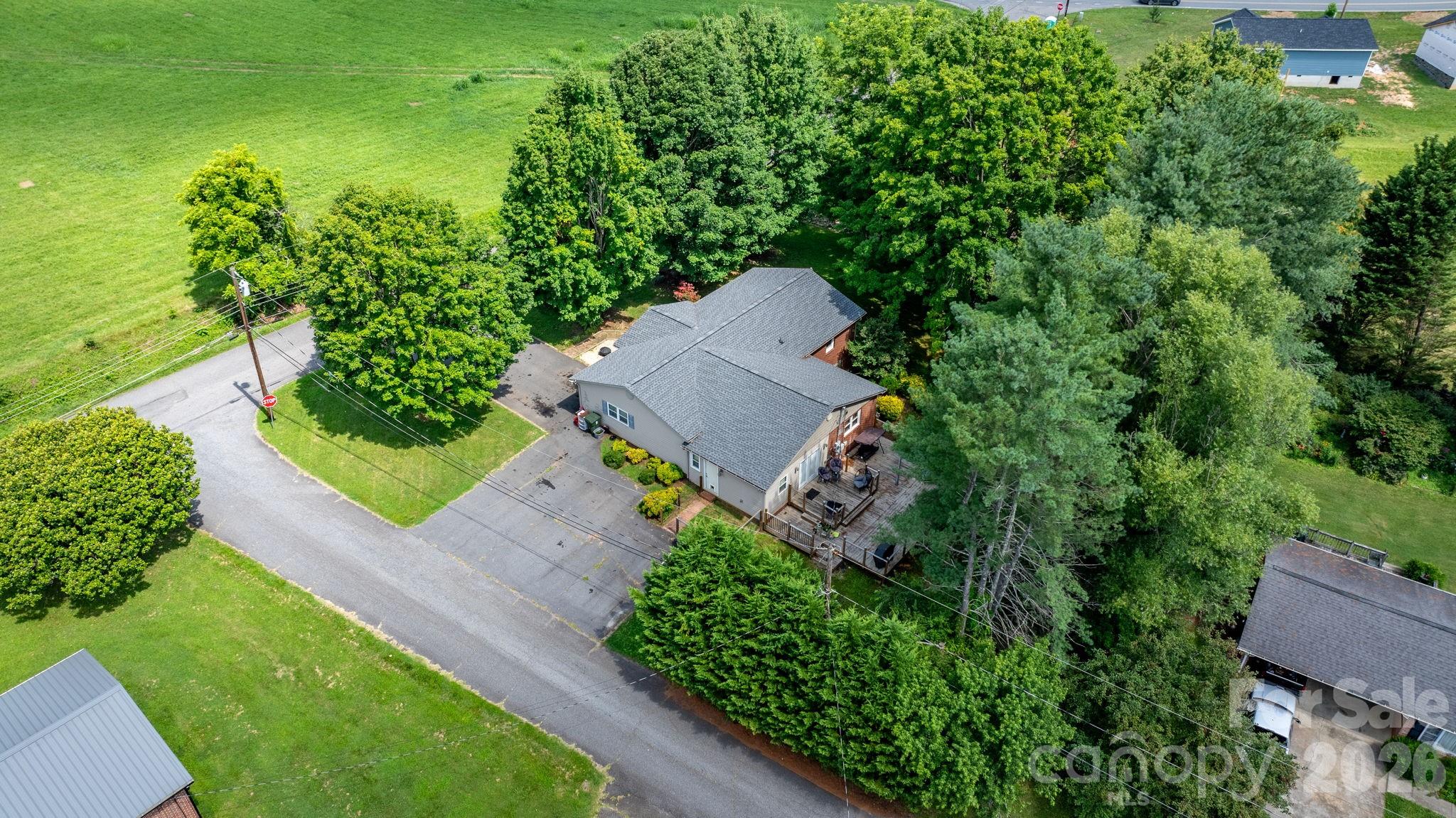 309 Sheldon Street Hudson, NC 28638 - Photo 35 of 35 an aerial view of a house with a yard