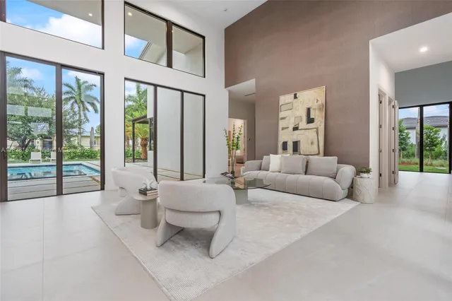 a bathroom with a granite countertop sink a toilet and a mirror