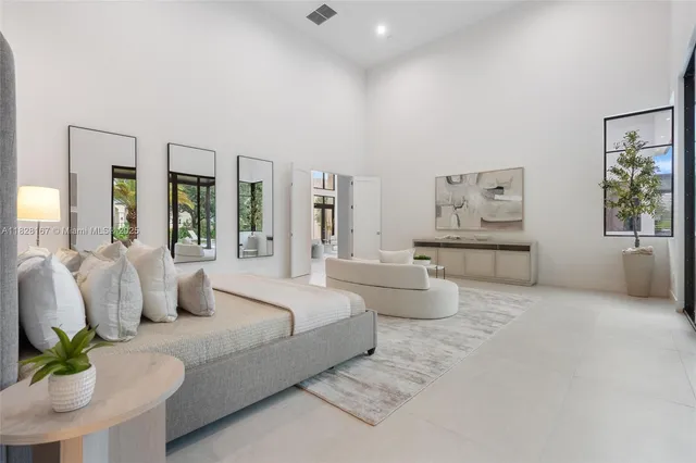 a living room with furniture a lamp and a lamp