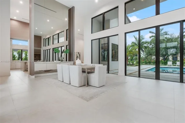 a view of a building with porch and furniture