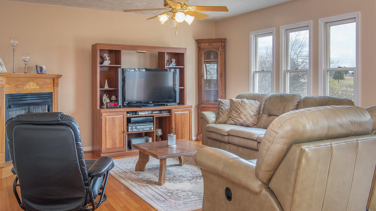 112 Aftons Meadow Road Vinton, VA 24179 - Photo 15 of 46 a living room with furniture and a flat screen tv