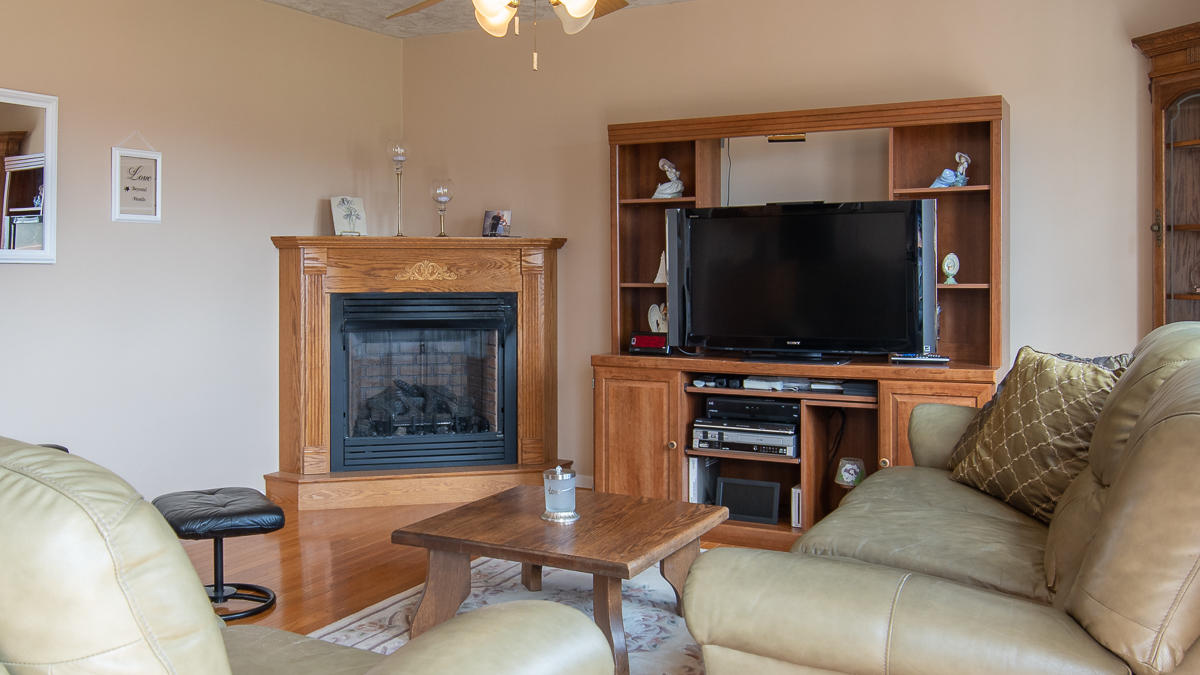112 Aftons Meadow Road Vinton, VA 24179 - Photo 16 of 46 a living room with furniture and a flat screen tv
