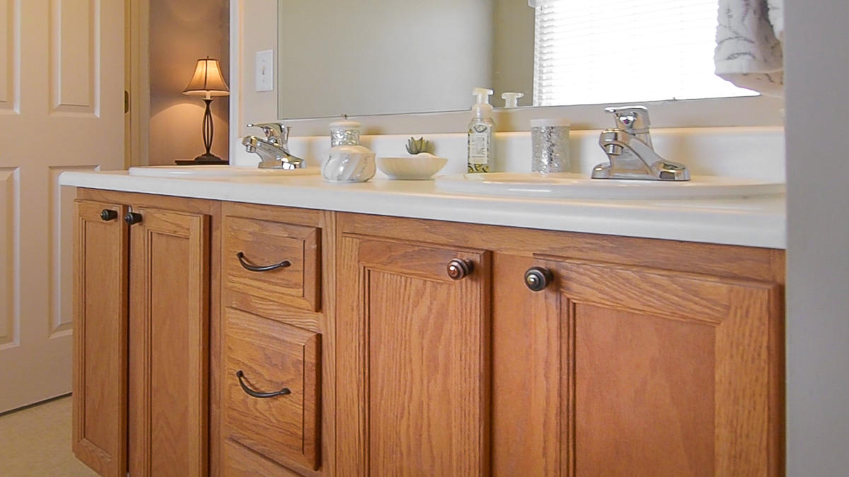 112 Aftons Meadow Road Vinton, VA 24179 - Photo 30 of 46 a bathroom with a sink and a mirror
