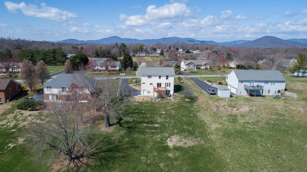 112 Aftons Meadow Road Vinton, VA 24179 - Photo 4 of 46 a view of a house with a yard and a garden