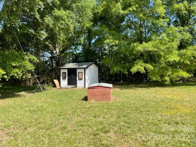 1608 Altura Road Fort Mill, SC 29708 - Photo 13 of 34 a backyard of a house with lots of green space