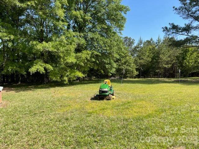1608 Altura Road Fort Mill, SC 29708 - Photo 14 of 34 a view of a swimming pool with a yard