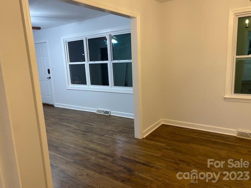 1608 Altura Road Fort Mill, SC 29708 - Photo 18 of 34 an empty room with wooden floor and windows
