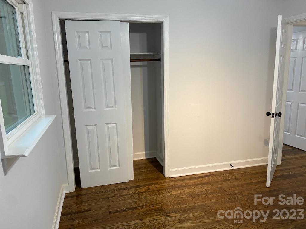 1608 Altura Road Fort Mill, SC 29708 - Photo 23 of 34 an empty room with wooden floor and entrance