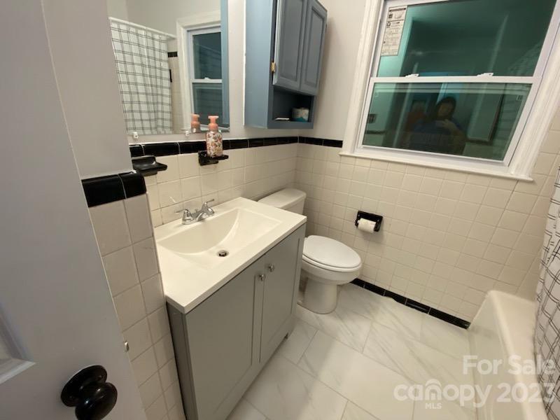 1608 Altura Road Fort Mill, SC 29708 - Photo 25 of 34 a bathroom with a sink and a mirror
