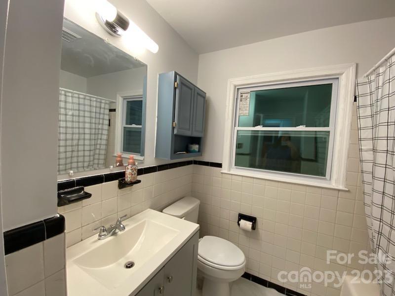 1608 Altura Road Fort Mill, SC 29708 - Photo 26 of 34 a bathroom with a sink toilet and shower