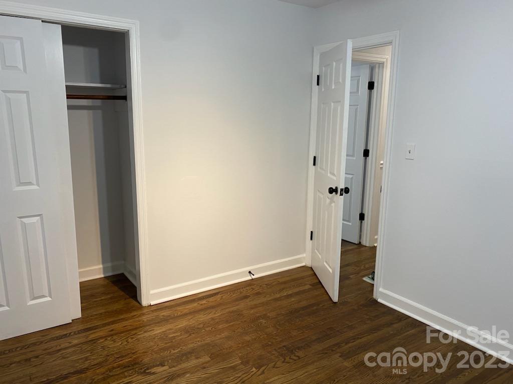 1608 Altura Road Fort Mill, SC 29708 - Photo 30 of 34 a view of an empty room with wooden floor and a window