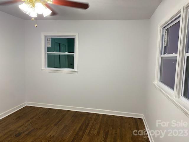 1608 Altura Road Fort Mill, SC 29708 - Photo 34 of 34 a view of an empty room with wooden floor and a window