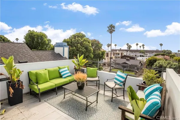 a view of a terrace with furniture