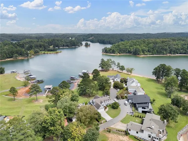 an aerial view of lake residential house with outdoor space